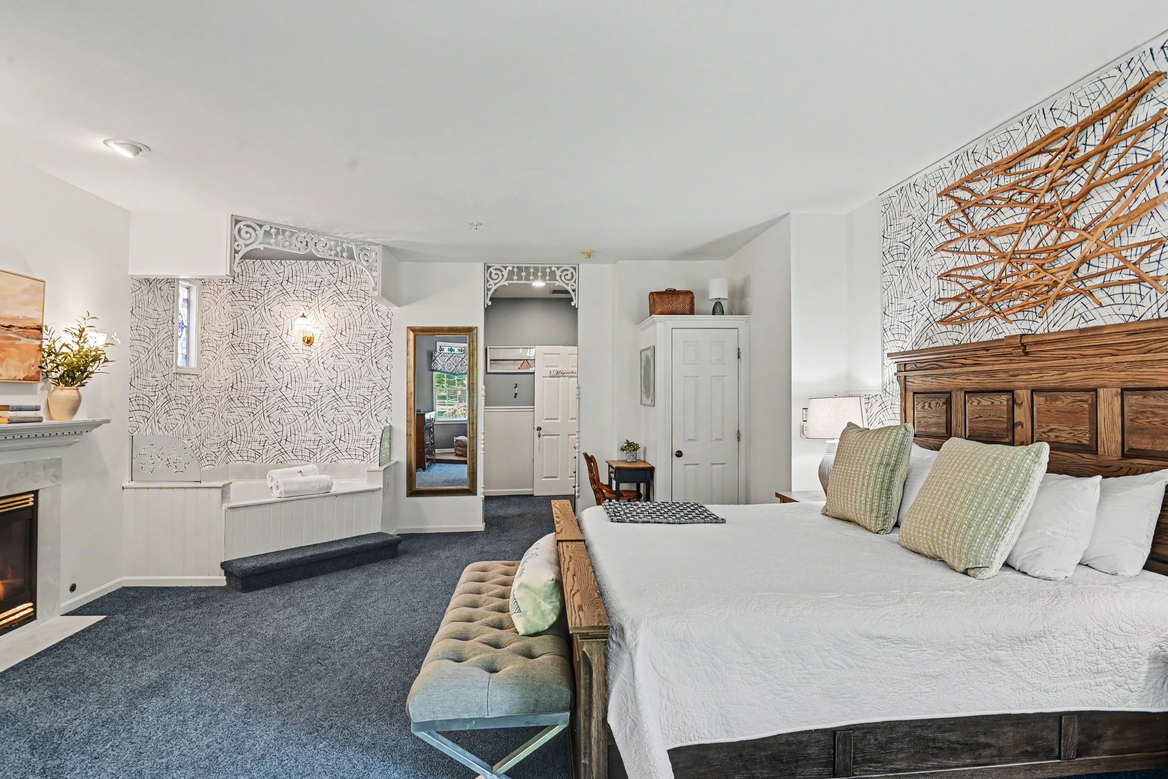 View facing bed with Jacuzzi in background