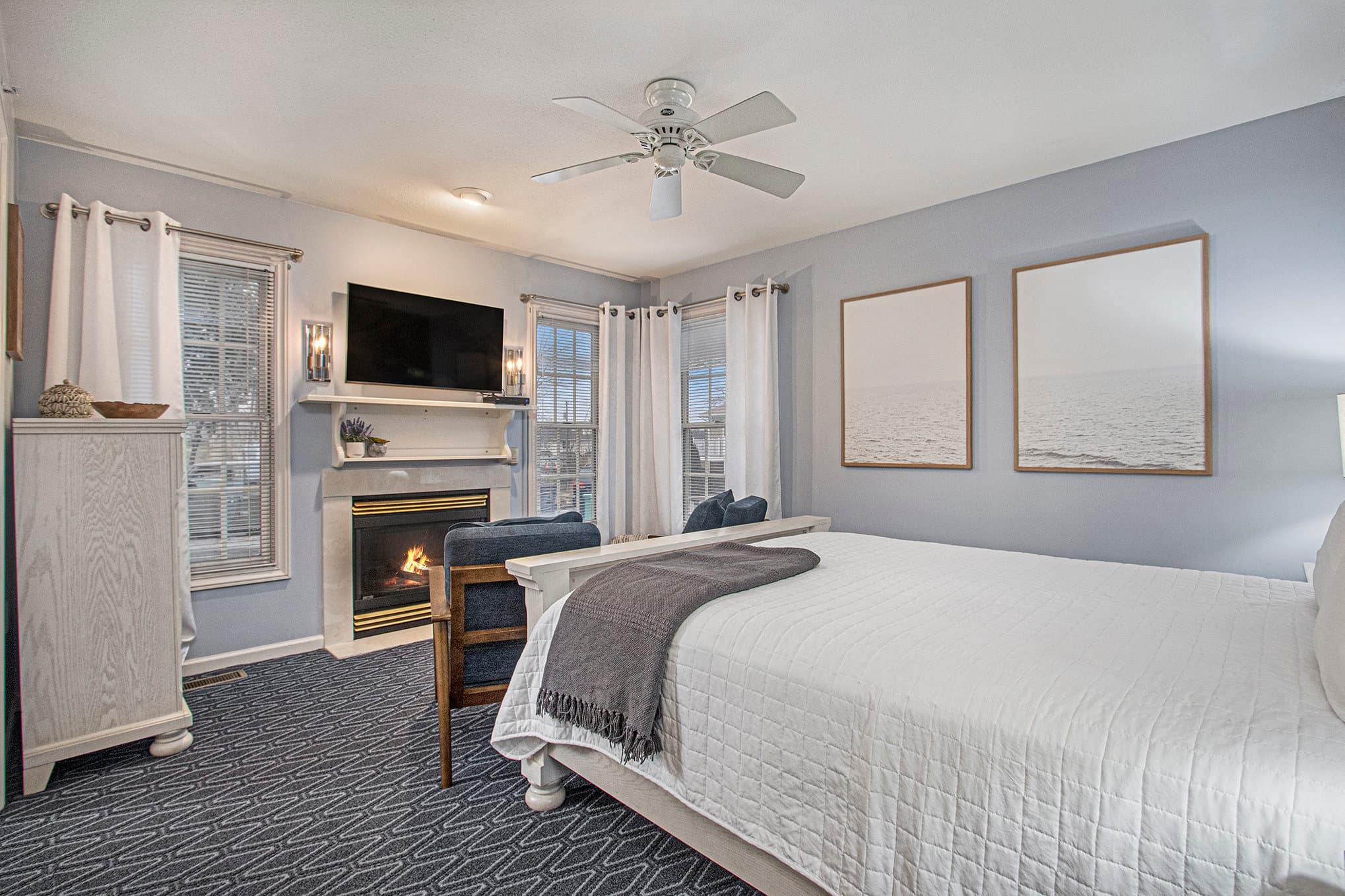 queen bed, flat screen tv and fireplace