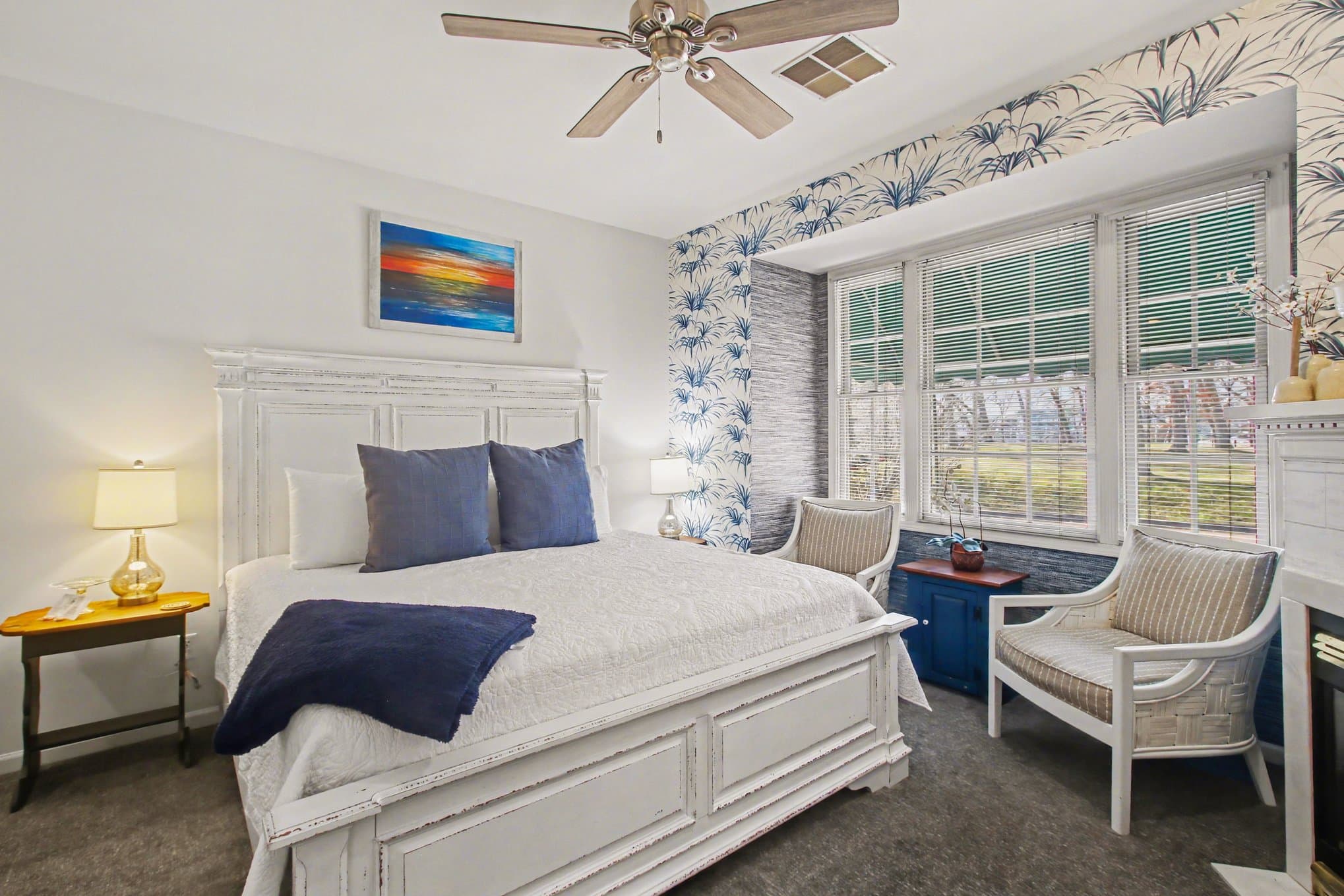 view of king bed and sitting area