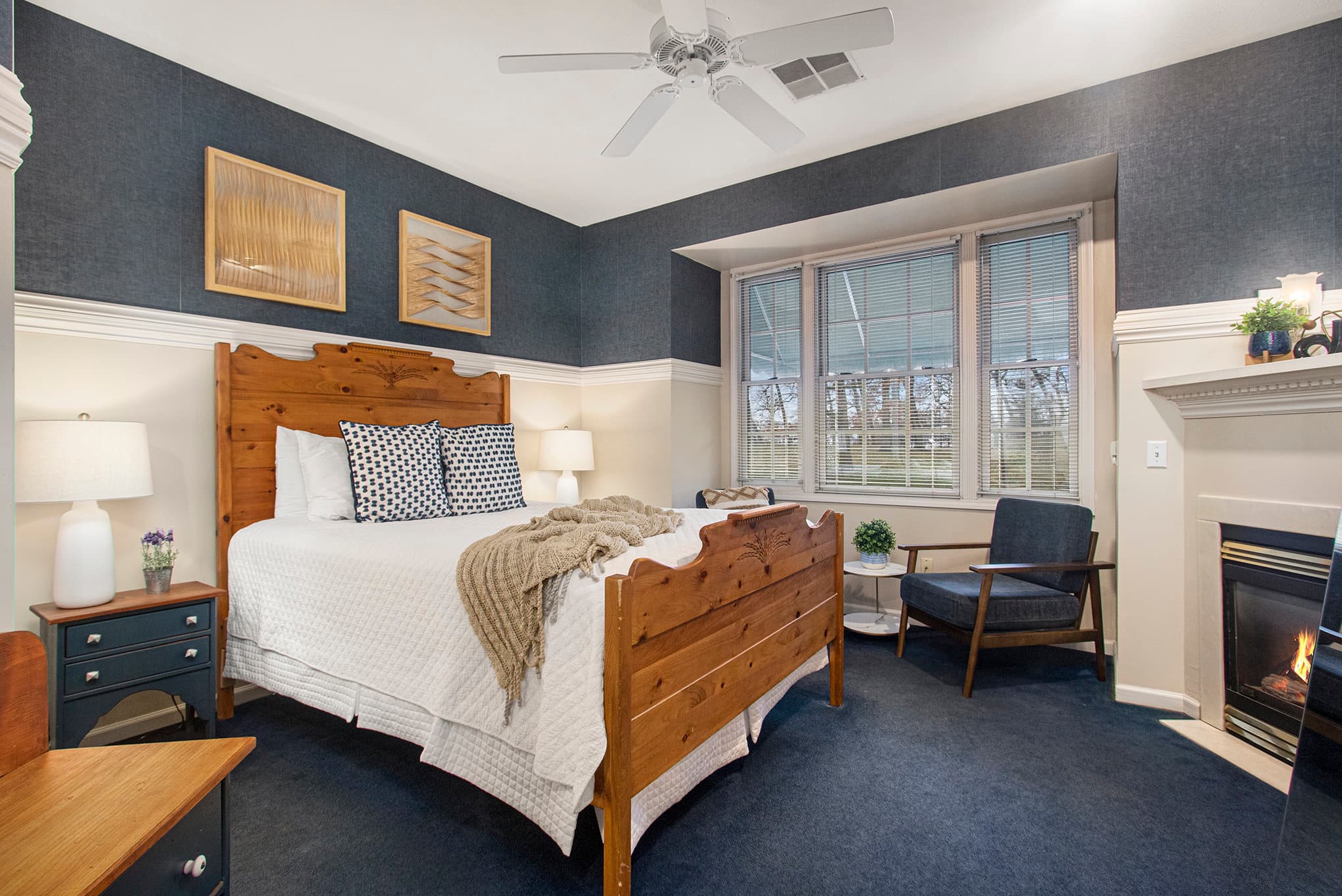 queen bed and bathroom entrance