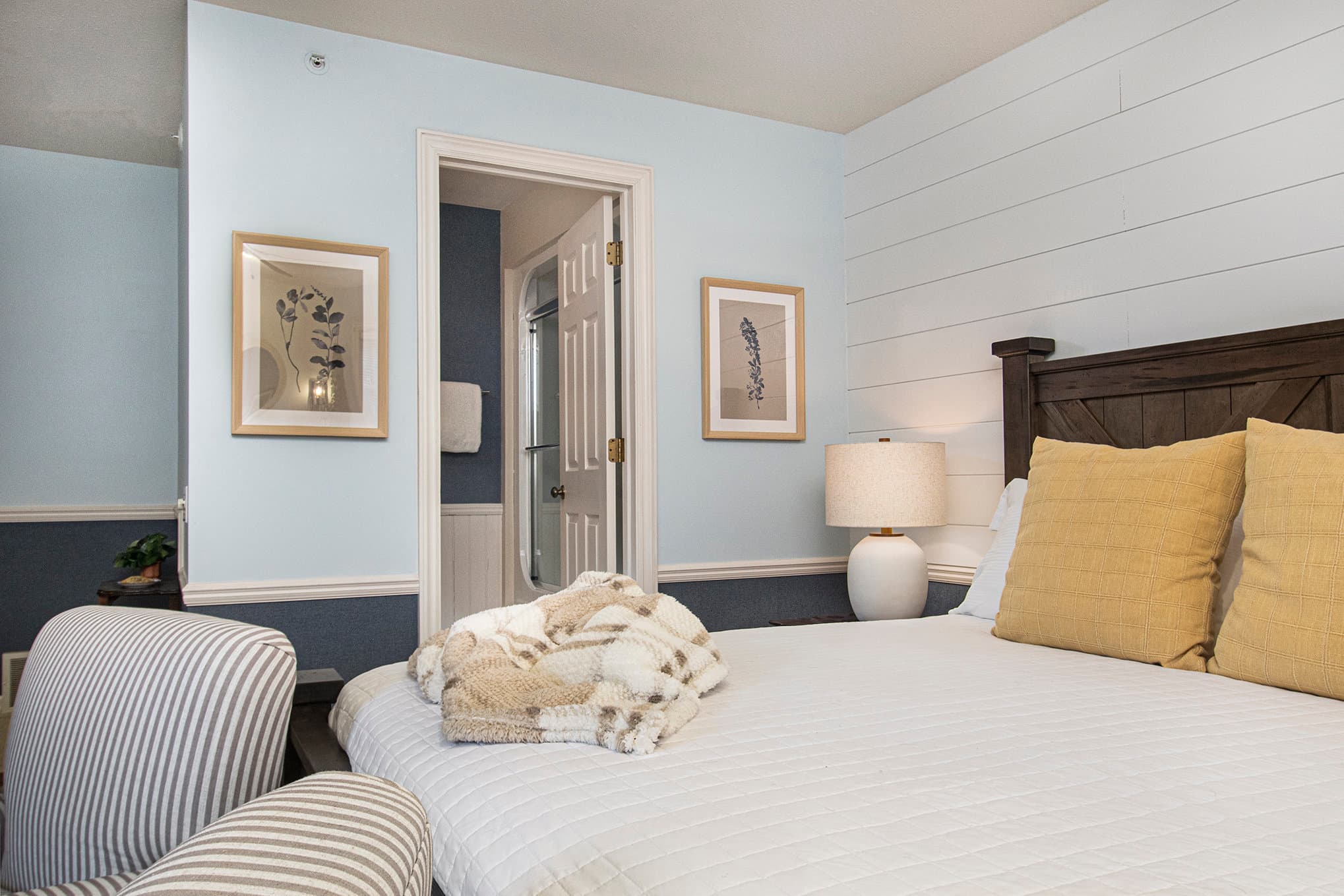 king bed and entrance to private bath
